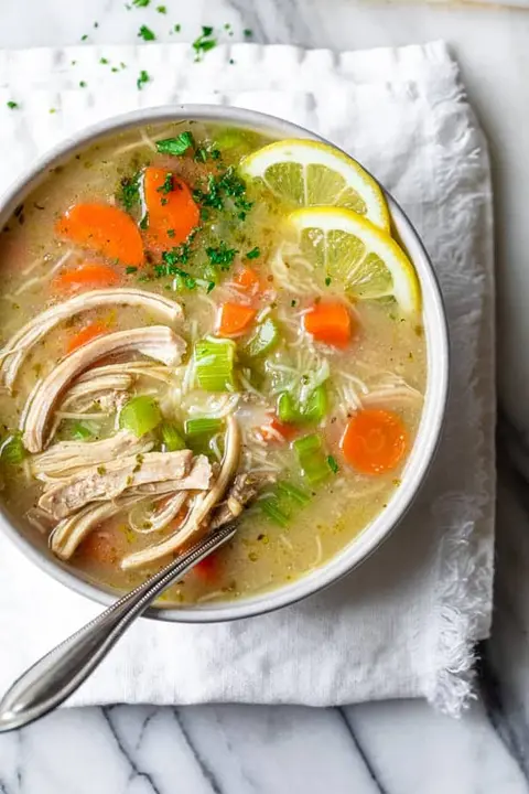 How long should I simmer chicken thighs for a chicken broth?